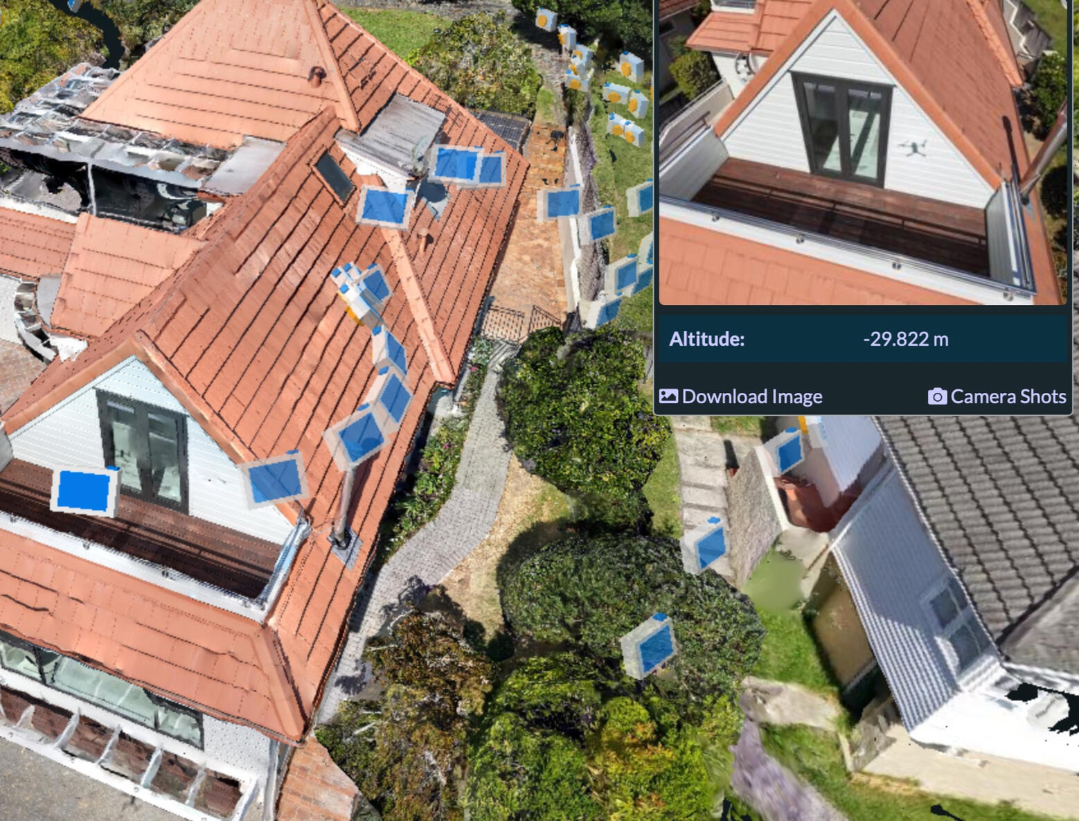 Aerial roof inspection with camera markers